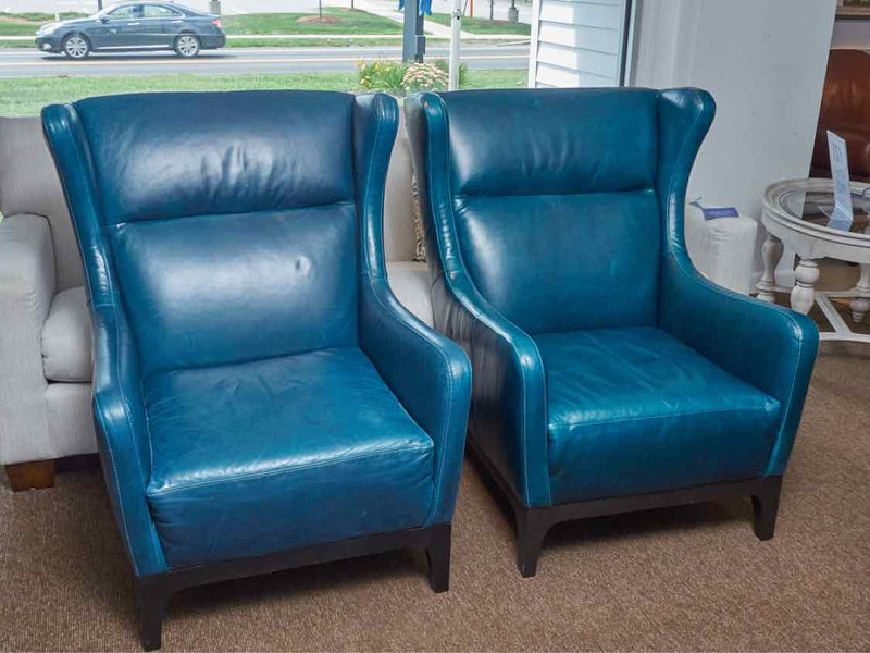 Pair Of 'Peacock Blue' Leather Wing Back Chairs