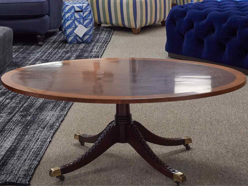 Kindel  Mahogany Pedestal Cocktail Table with Banded Inlay Top & Casters