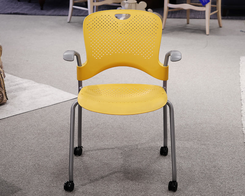 Herman Caper Stacking Chair in Yellow on Casters