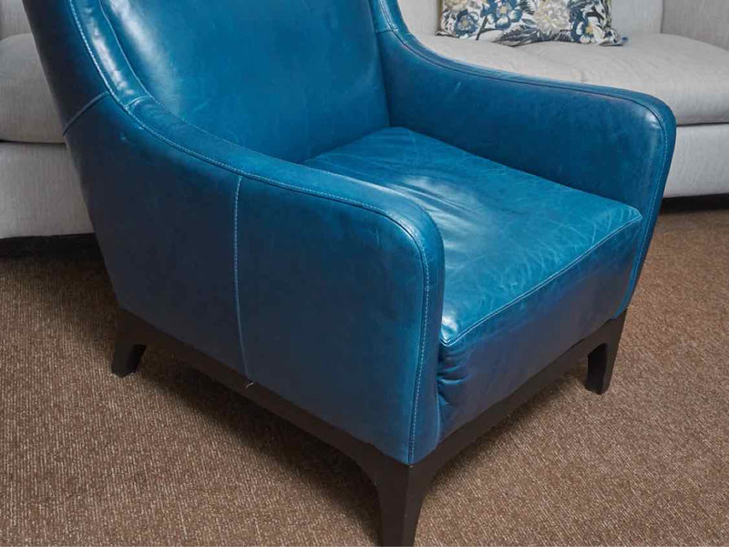 Pair Of 'Peacock Blue' Leather Wing Back Chairs