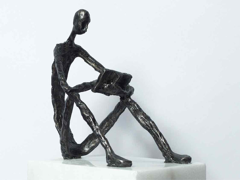 'Sit Back, Relax and Read' Sculpture