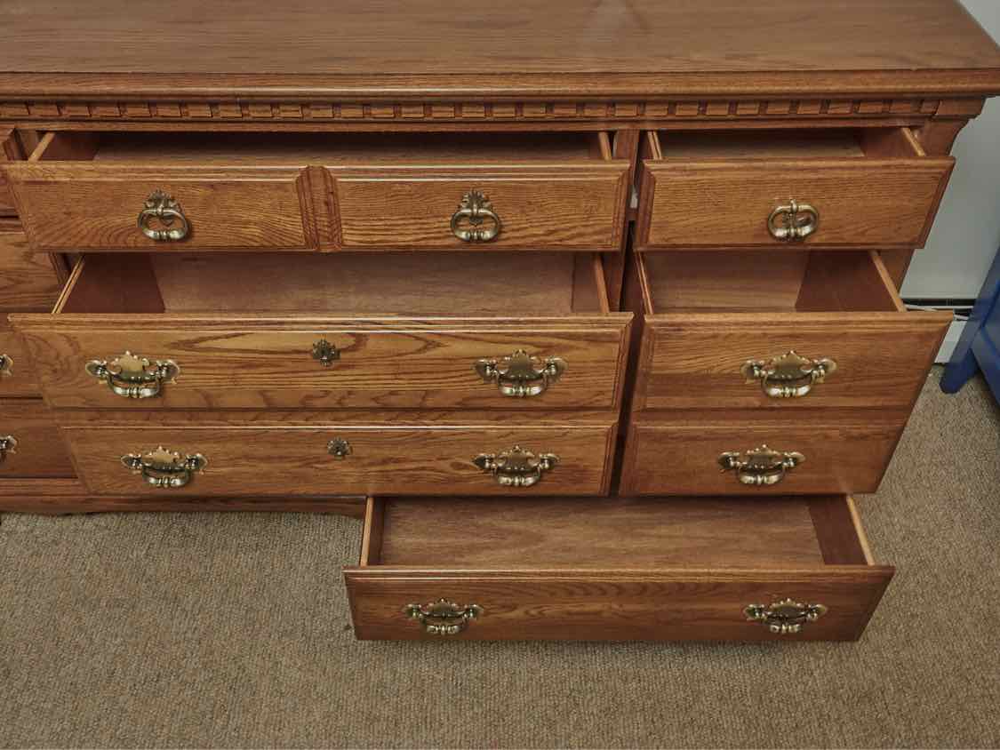 Kincaid Oak 8 Drawer Double Dresser with Ornate Chippendale Handles