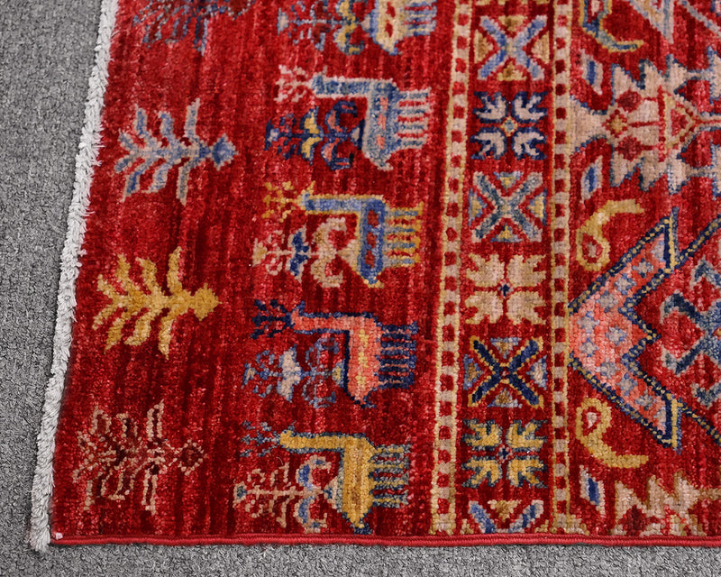 Arijana Wool 5.5 x 8 Area Rug in Dark Red with Flora & Fauna Motif