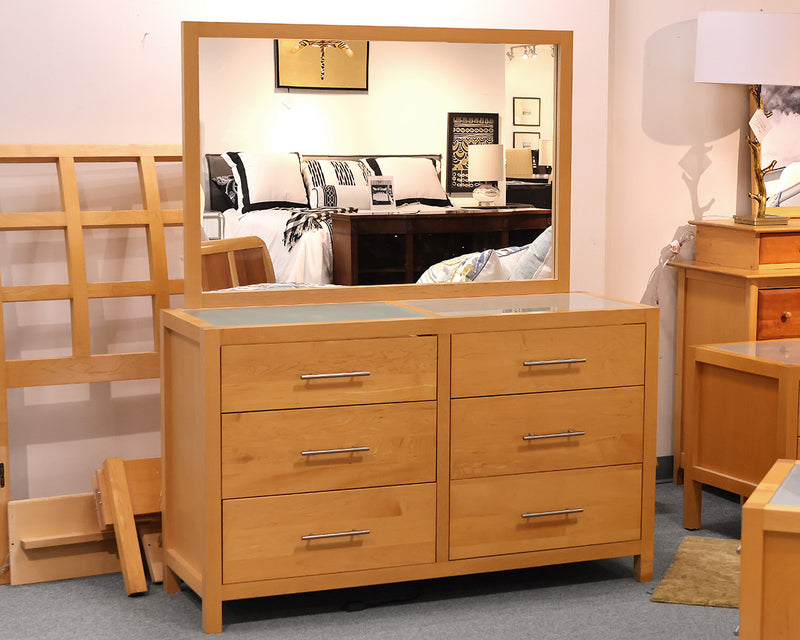 Copeland Dresser Light maple dresser with attached mirror.